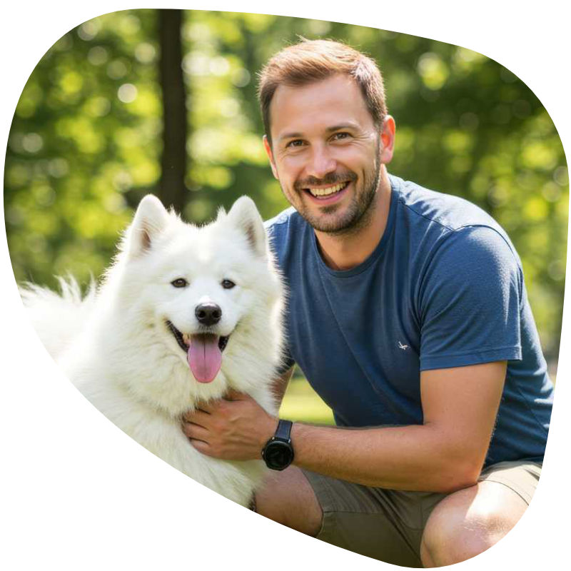 photo of a man with a dog in a park